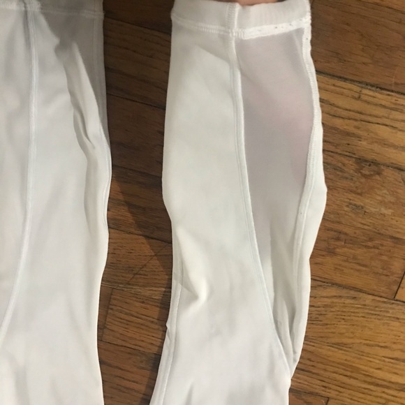 Lululemon white leggings with see through detail on lower legs. - Picture 5 of 8